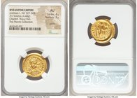 Justinian I the Great (AD 527-565). AV solidus (21mm, 4.44 gm, 6h). NGC AU 4/5 - 2/5, graffiti, clipped, wavy flan.  Constantinople, 10th officina, AD...