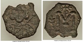 Tiberius III Apsimar (AD 698-705). AE follis (19mm, 2.96 gm, 7h). VF. Syracuse, AD 698-701. Crowned and cuirassed bust facing, holding shield decorate...