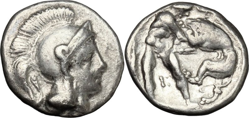 Greek Italy. Southern Apulia, Tarentum. AR Diobol, 325-280 BC. D/ Head of Athena...