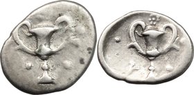 Greek Italy. Southern Apulia, Tarentum. AR Obol, c. 280-228 BC. D/ Kantharos; five pellets around. R/ Kantharos; four pellets around and rosette above...
