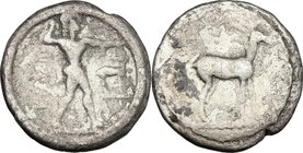 Greek Italy. Bruttium, Kaulonia. AR Drachm or Triobol, c. 475-425 BC. D/ KAV. Apollo advancing right, holding branch; to right, stag. R/ Stag right. H...