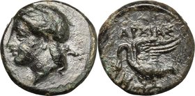 Greek Asia. Ionia, Leukai. AE 12 mm. c. 380-360 BC. D/ Laureate head of Apollo left. R/ APXIAΣ. Swann standing left, wings open; uncertain control bel...