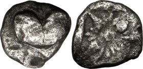 Africa. Cyrenaica, Cyrene. AR Obol, c. 525-480 BC. D/ Silphium fruit. R/ Floral pattern set in star formation around a central pellet; all within incu...