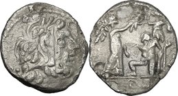 C. Fundanius. AR Quinarius, 101 BC. D/ Laureate head of Jupiter right; behind, D and dot. R/ Victory right erecting trophy at base of which kneels a c...