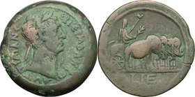 Trajan (98-117). AE Drachm, Alexandria mint, 111-112 AD. D/ Laureate bust right, aegis on shoulder. R/ Emperor, holding branch and sceptre, in elephan...