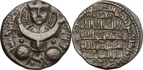 Artuqids of Mardin. Nasir al-Din Mahmud (616-631 H / 1219-1234 AD). Dirham. D/ Crowned Turkish female figure seated cross-legged and holding a large c...