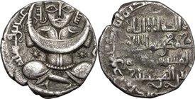 Artuqids of Mardin. Nasir al-Din Mahmud (616-631 H / 1219-1234 AD). Dirham. D/ Crowned Turkish female figure seated cross-legged and holding a large c...