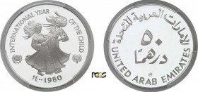 547-Emirats Arabes Unis (1971 à nos jours)
 50 dirhams - 1980 - Année Internationale de l'Enfant.
 27.22g - KM 7
 Flan Bruni - PCGS PR 67 DEEP CAME...
