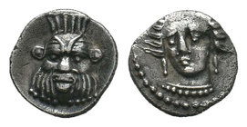 Cilicia, Uncertain mint. Silver Obol, 4th century BC. Female head (Arethusa?) facing slightly left. Reverse: Facing head of Bes. Göktürk 44; SNG BN 48...