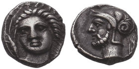 Cilicia, Tarsos. AR Obol, c. 380-361/0 BC. Obv. Head of a female facing slightly to left. Rev. Bearded male head (of Ares?) to left, wearing crested A...