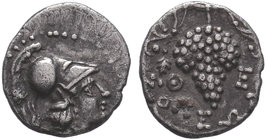 CILICIA. Soloi. Ca. 410-375 BC. AR obol . The-, magistrate. Head of Athena right, wearing crested Corinthian helmet / ΣO-ΛEΩN, large bunch of grapes w...