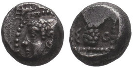 CILICIA Soloi Obol, circa 425-400 BC. Av .: head of an Amazon with winged pointed cap n.l. Rv .: Σ - O, grape in the pearl square, all in the flat squ...