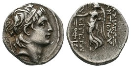 SELEUKID EMPIRE. Antiochos VII Euergetes (Sidetes). 138-129 BC. AR Drachm. Tarsos mint, Royal Workshop. Diademed head right / Nike advancing left, hol...