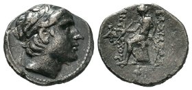 Seleukid Empire, Antiochos III 'the Great' AR Drachm, 222-187 BC. BC. Diademed head right / Apollo Delphios seated left on omphalos, testing arrows an...