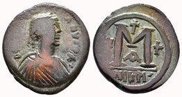 Justinian I, AE Follis, Nicomedia, 527-565 AD. DN IVSTINIANVS P AVG, Diademed, draped and cuirassed bust right / Large M, Cross left, right and above,...