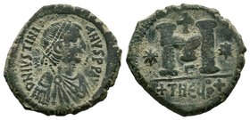 Justinian I, AE Follis. Antioch. DN IVSTINIANVS PP AVG, pearl diademed, draped, cuirassed bust right / Large M, star to left, cross above, star to rig...