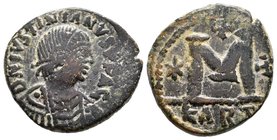 Justinian I. AE Follis, Carthage. DN IVSTINIANVS PP AVG, pearl diademed, draped, cuirassed, undecorated bust right / Large M, star to left, cross abov...