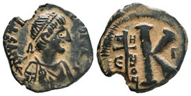 Justinian I, AE Half-Follis. Antioch. DN IVSTINIANVS PP AVG, pearl diademed, draped, cuirassed bust right / Large K, long cross to left with T/H- E/U/...