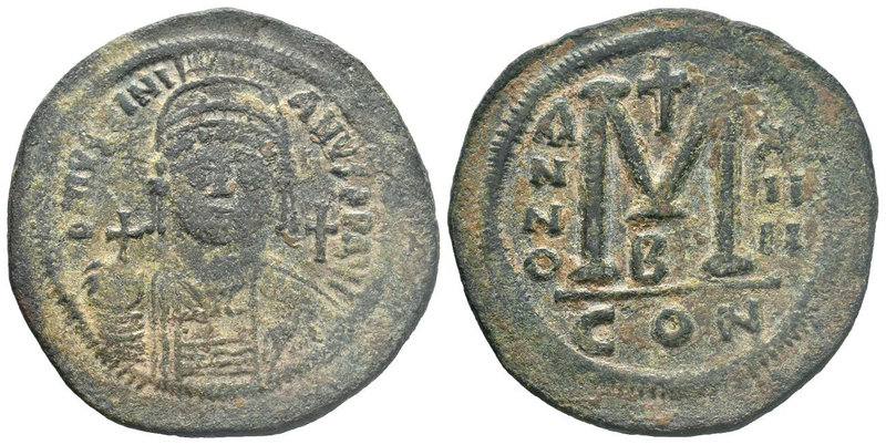 Justinian I, AE Follis. Constantinople. 527-565 AD. DN IVSTINIANVS PP AVG, helme...