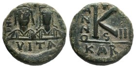Justin II and Sophia, AE half follis, Carthage mint. 573 AD. DN IVSTINO ET SOFIA AC, Crowned busts of Justin and Sophia facing, cross between them, VI...