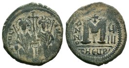 Justin II and Sophia, AE Follis. Antioch as Theopolis. Legend usually blundered, Justin left and Sophia right, seated facing on double-throne, both ni...