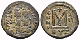 Justin II and Sophia, AE Follis. Cyzicus. DN IVSTINVS PP AVG, Justin at left, Sophia at right, seated facing on double-throne, both nimbate, Justin ho...