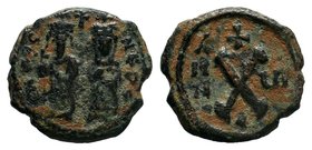Phocas and Leontia. 602-610 AD. AE Half Follis. Antioch. ON FOCA NEPE AV, Phocas on left, holding cross on globe and Leontia on right, holding sceptre...