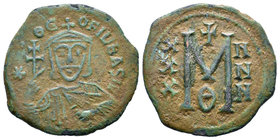 Theophilus, 829-842.AE Follis , Constantinople. * . ΘEOFIL bASIL Facing bust of Theophilus, wearing crown with cross and chlamys, holding patiarchal c...