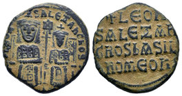Leo VI with Alexander, 886-912 AD. AE Follis. Constantinople. LEON S ALEXANDROS, Leo on left and Alexander on right, both crowned and wearing loros, s...