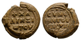 Lead Seal of Symeon Chalindiotes (ca 11th cent.), Obverse: Inscription in 3 lines: CΥΜΕ/ ΩΝ ΤΟΥ/ [ΕΚ?] ΠΑΤΡ(ΟC?) ([Seal] of Symeon, whose father is?) ...