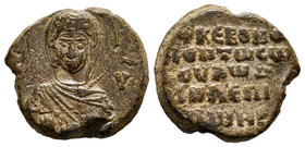 Lead seal of Demas(?) in charge of R..., Diam.: mm Weight: gr. Condition: VF. Attractive brown natural patina. Obverse: The bust of the Mother of God,...
