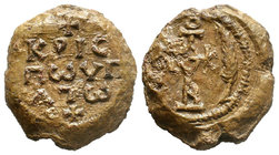 Lead seal of Crispus hypatos (7th cent.) Diam.: mm Weight: gr. Condition: VF. Attractive light brown natural patina. Obverse: Invocative cruciform mon...