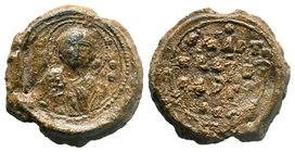 Lead seal of Sergios (ca 11th cent.) Diam.: mm Weight: gr. Condition: F. Brown natural patina. Obverse: The bust of a woman saint, most possibly of ma...