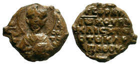 Lead seal of John kouboukleisios and charoularios the Karpathos (ca 11th cent.) Diam.: mm Weight: gr. Condition: About VF. Brown natural patina. Obver...