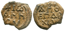 Lead seal of the honorary eparch John (7th cent.) Diam.: mm Weight: gr. Condition: VF. Brown natural patina. Obverse: Inscription in 3 lines: + ΙΩΑΝΝΟ...