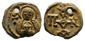 Lead seal of Pantherios (7th cent.) Diam.: mm Weight: gr. Condition: VF. Holed at the upper part. Obverse: The bust Mother of God, en face, holding in...