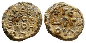 Lead seal of George (7th cent.) Diam.: mm Weight: gr. Condition: VF. Brown natural patina. Obverse: Inscription in 4 lines: + ΘΕΟΤΟΚΕ ΒΟΗΘΗ + (Mother ...