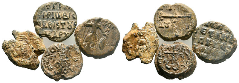 A lot of 4 byzantine lead seals (6th-12th cent.) The lot comprises several types...