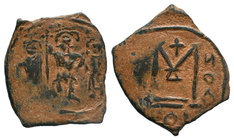 Arab-Byzantine, Anonymous, pseudo-Byzantine Fals, three standing figures type, Album 3501; W 124. 
Diameter: 21mm
Weight: 2.33gr
Condition: Very Fi...