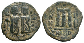 ARAB-BYZANTINE: Two Standing Figures, ca. 650s-670s, AE fals , "year 4 ", obverse derived from MIB-83 of Phocus, mint of Antioch, Album 3502
Diameter...