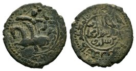 SALDUQIDS: Nasir al-Din Muhammad, 1168-1191, AE fals , NM& ND, mounted archer shooting arrow at small animal , citing the western Seljuq overlord Tugh...