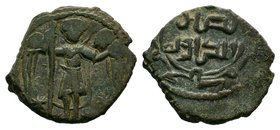 SALDUQIDS: Nasir al-Dawla Ghazi, 1132-1145, AE fals , NM, ND, standing figure holding long cross and diadem, with cornucopiae in background, possibly ...