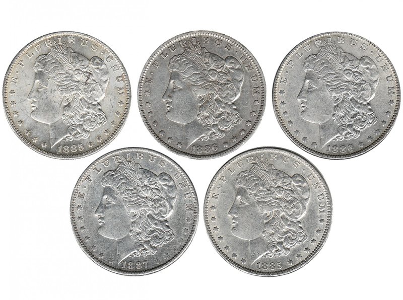 ESTADOS UNIDOS. Lote de 5 monedas de 1 dólar (1885, 1885-O, 1886, 1886-O, 1887)....