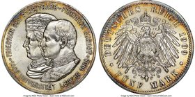 Saxony. Friedrich August III 5 Mark 1909 MS64+ NGC, KM1269. University of Leipzig commemorative. Mint bloom with peripheral gold, red and blue toning....