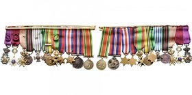 BELGIQUE, groupe de 12 miniatures avec ruban montées sur une barrette métallique ayant appartenu à un officier pilote évadé de Belgique et ayant servi...