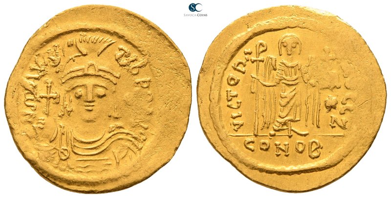 Maurice Tiberius AD 582-602. Constantinople. 7th officina
Solidus AV

21mm., ...