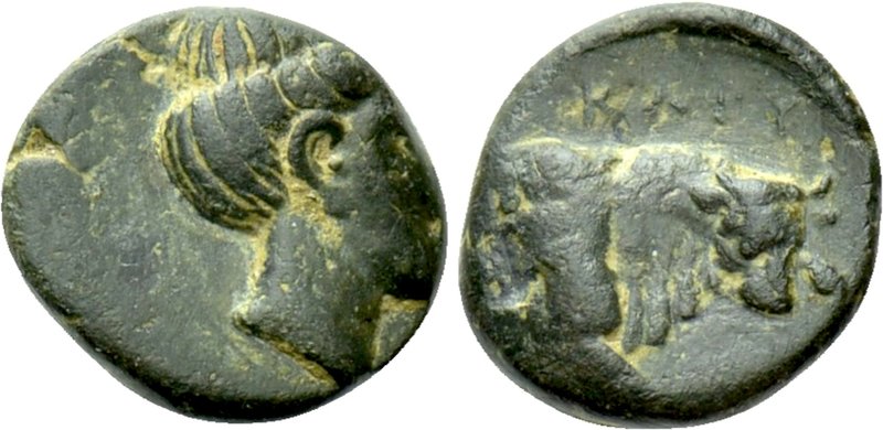 EUBOIA. Karystos. Ae (4th century BC). 

Obv: Head of Nymph right.
Rev: KAPY....