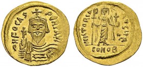 BYZANTINE EMPIRE. 
 Phocas, 602-610. Solidus, Constantinople, officina E. Obv. δN FOCAS PЄRP AUC. Cuirassed bust facing, wearing crown and holding gl...