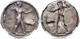 BRUTTIUM. Caulonia. Late 6th century BC. AR stater or nomos (29mm, 7.96 gm, 12h). NGC VF 5/5 - 3/5, graffito. KAVΛ, full-length figure of nude Apollo ...
