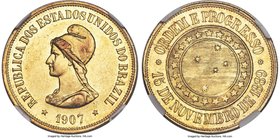 Republic gold 20000 Reis 1907 AU58 NGC, Rio de Janeiro mint, KM497. A very lustrous example with wispy friction marks in the fields and very little ci...
